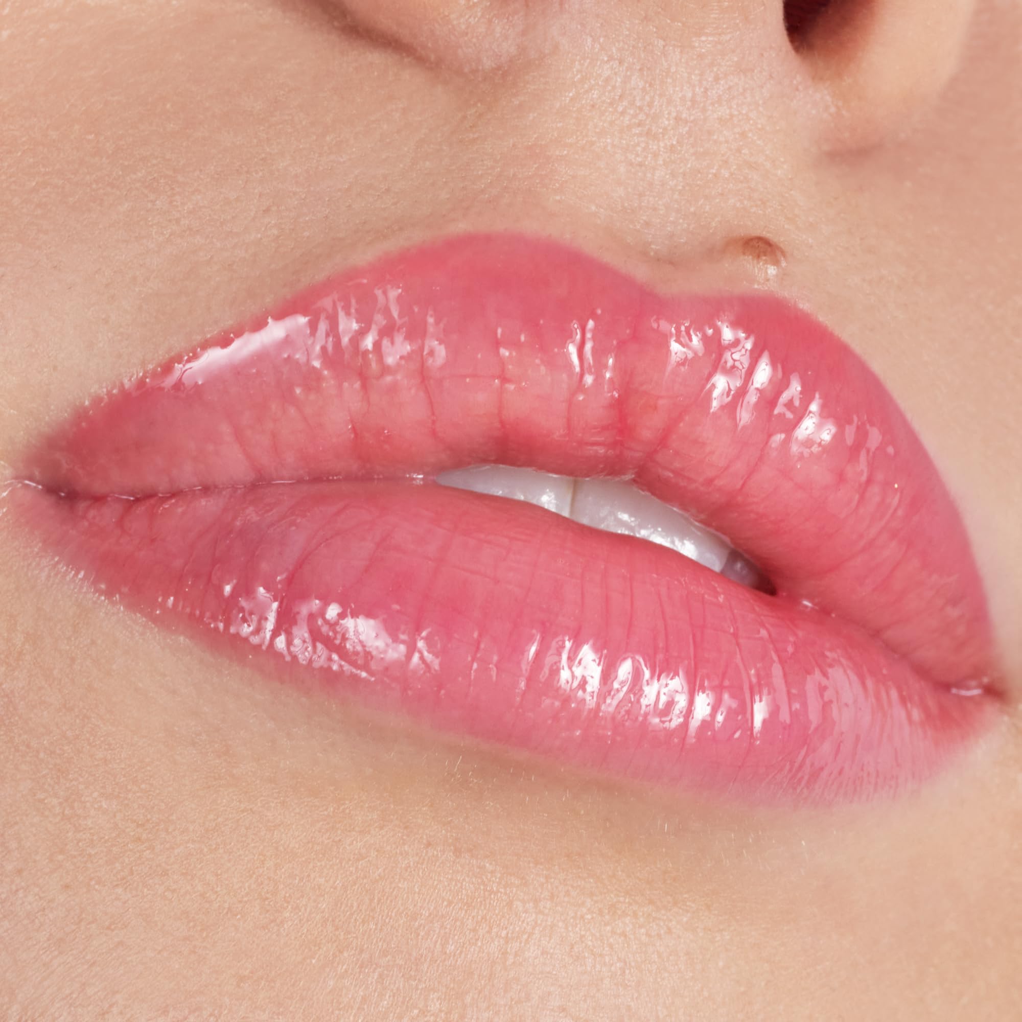 catrice-plump-it-up-lip-booster-090-lipgloss-rot-3x3-5-ml image 4