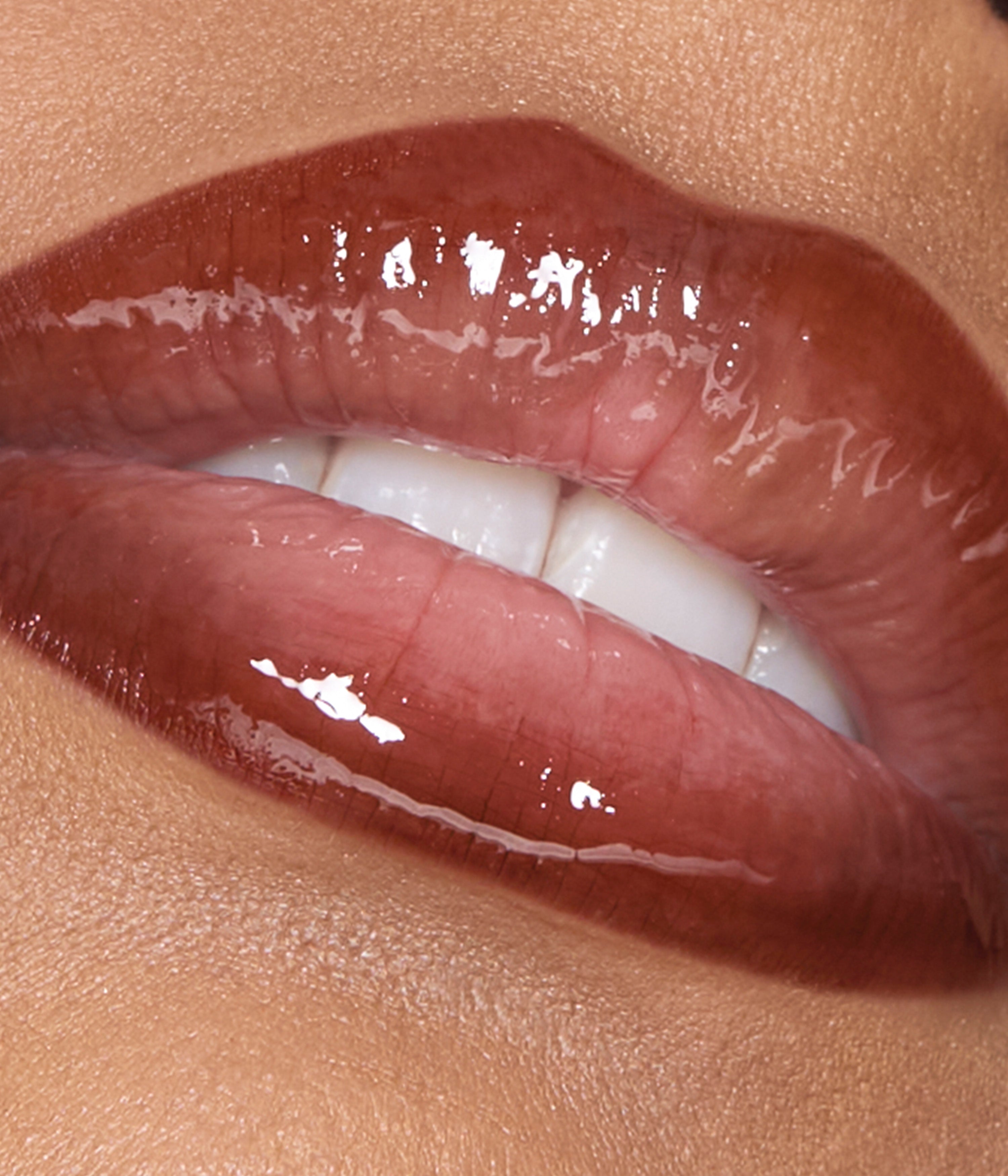 huda-beauty-faux-filler-makeout-sesh-lip-duo-peachy-nudes-lip-set-2 image 2